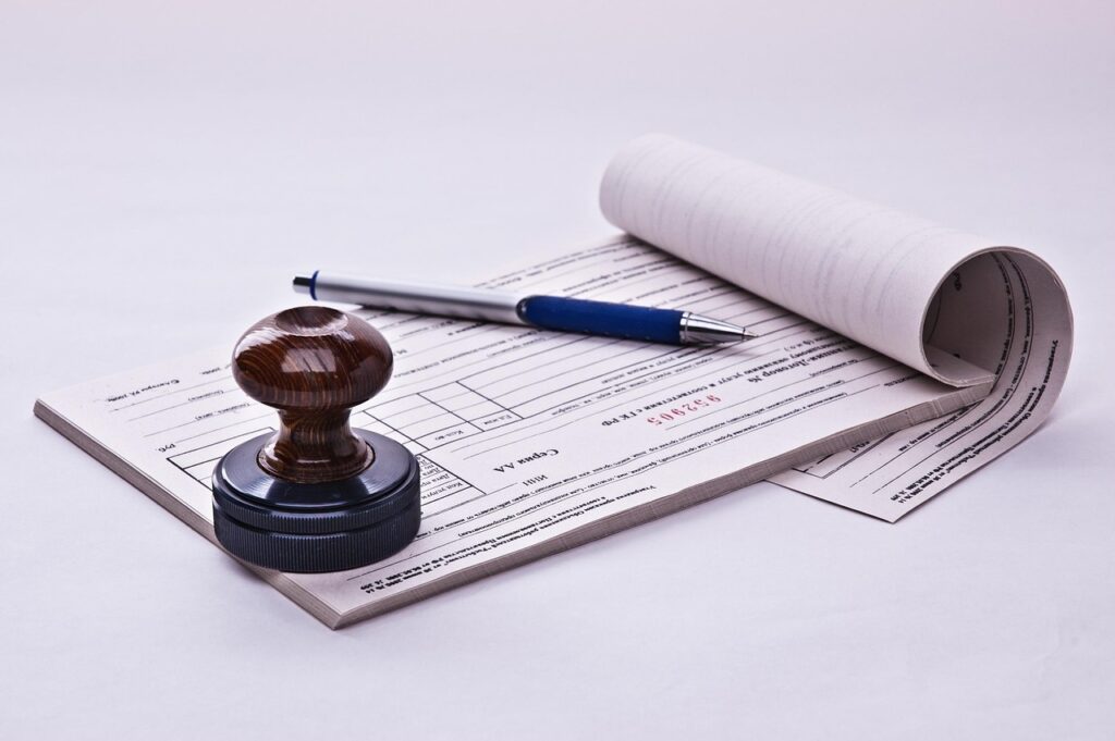 Imagen de un sello y un talonario